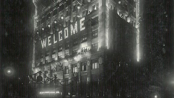 Photograph showing decorations by night on the buildings for the Prince of Wales’ visit to Australia, June 1920.