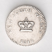 7. A fifteen pence or ‘dump’ coin created by puncturing a ‘holey dollar’ coin.