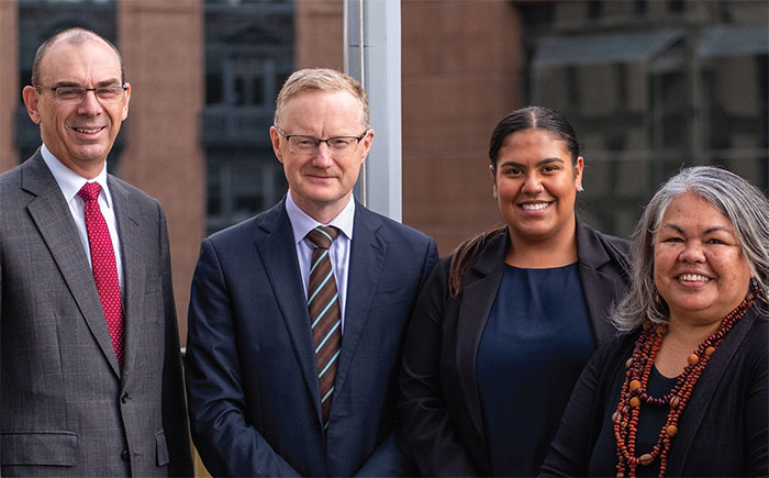 (Top from left) Wayne Byres (Payments System Board member and APRA Chairman), Governor Philip Lowe, Shakeela Williams and Susan Moylan-Coombs (granddaughter of the Bank's first Governor, HC Coombs) at the flag raising ceremony during Reconciliation Week, Sydney, May 2018