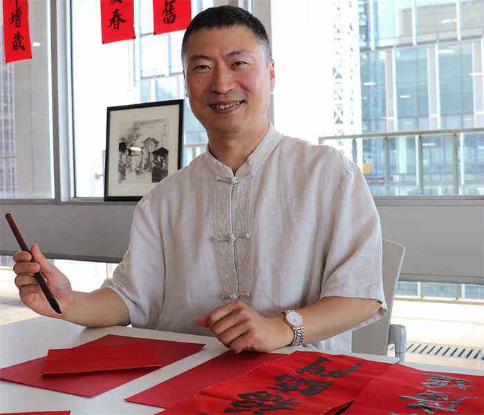 David Nieh (IT) skilfully demonstrated the traditional Chinese art of calligraphy as part of the Bank's Lunar New Year celebrations