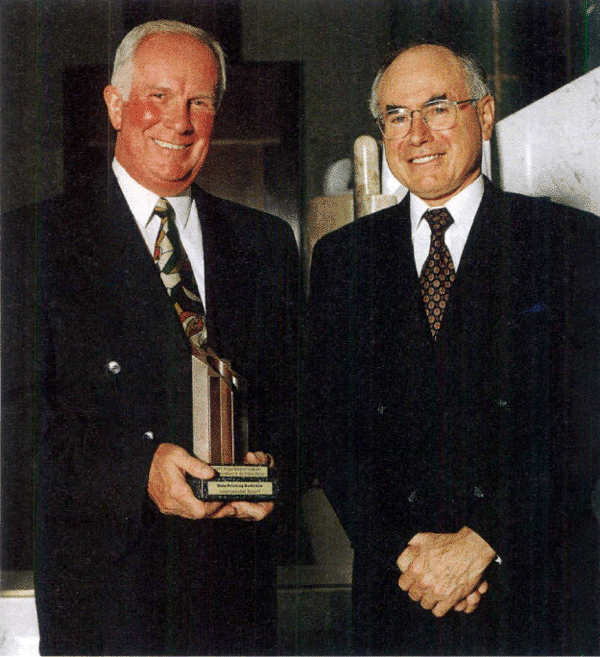 Robert Larkin, Managing Director of NPA, with the Prime Minister, on the occasion of the presentation of the Prime Minister's Award and a High Commendation in the ‘International Export’ category of the 1997 Inaugural Prime Minister's Awards for Innovation in the Public Sector – Parliament House, Canberra, February 1997