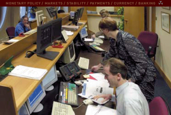 The dealing room in the RBA's London Office. From left: Eric Lymer; Anita Godden; Stephanie Weston, Deputy Chief Representative; Sean Maloney.