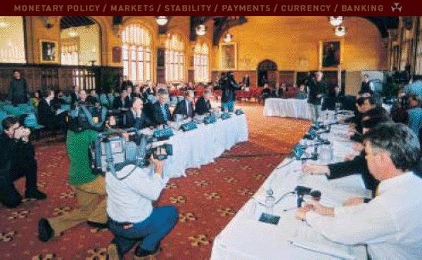 The May 2002 appearance before the House of Representatives Standing Committee on Economics, Finance and Public Administration took place in MacLaurin Hall at the University of Sydney. From left: Ric Battellino, Assistant Governor (Financial Markets); Ian Macfarlane, Governor; Glenn Stevens, Deputy Governor; Malcolm Edey, Assistant Governor (Economic).