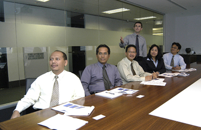 Photograph: Members of the third attachment of staff from Bank Indonesia attend an informal presentation on risk management practices by Keith Drayton, Senior Manager, Financial Markets Group.
