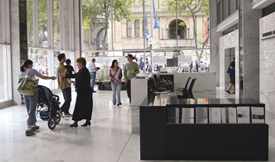 Photograph: Virginia MacDonald of Information Department welcomes members of the public visiting the Museum of Australian Currency Notes on Australia Day.