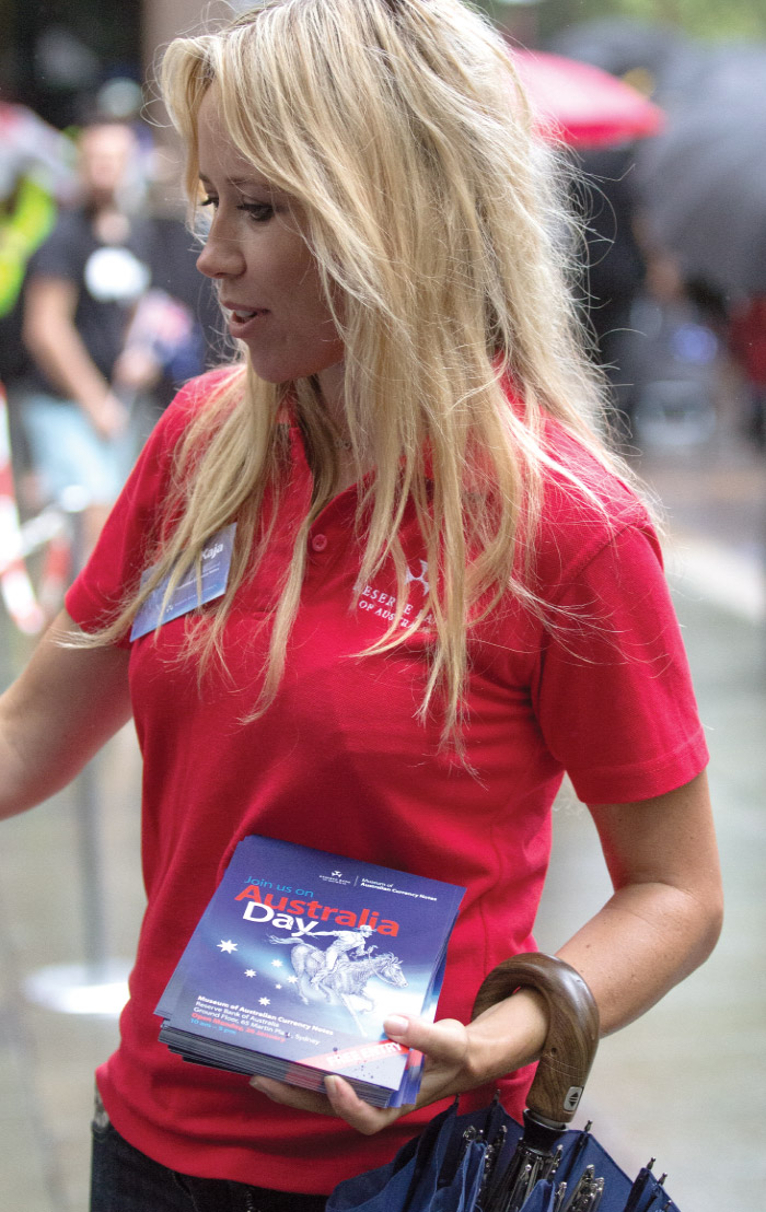 Information Department's Kaja Troa distributing Australia Day flyers for the Museum of Australian Currency Notes, Australia Day 2015