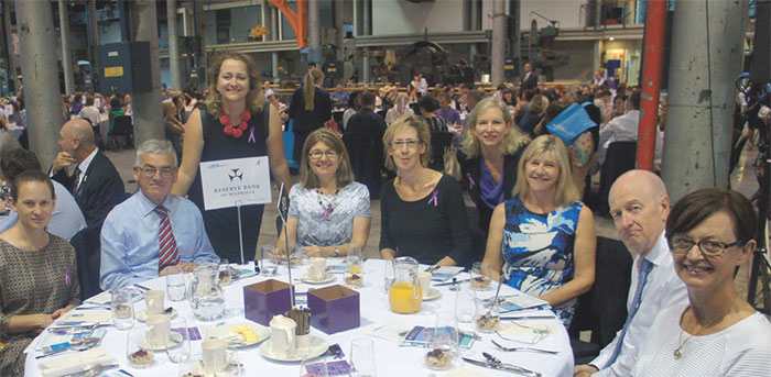 Reserve Bank staff (from left) Morgan Spearritt, Frank Campbell (Assistant Governor, Corporate Services), Sarah Hepburn, Colleen Andersen, Jennifer Royle, Kylie Fuller, Bronwyn Nicholas, Governor Glenn Stevens and Dale Simpson at an International Women's Day Breakfast, March 2016