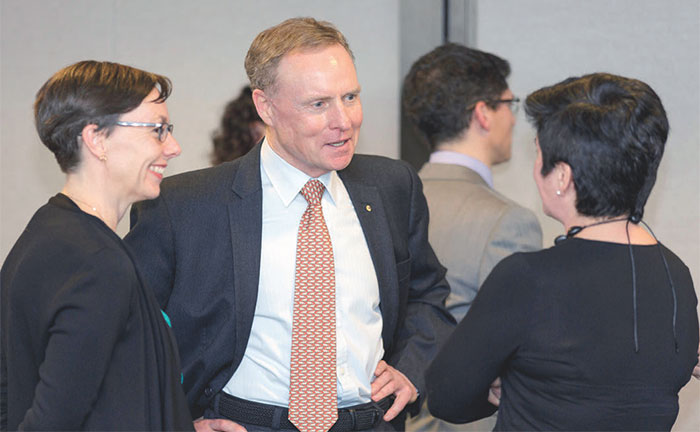 Australian of the Year David Morrison AO speaks with Head of Human Resources Department Melissa Hope and Head of Information Department Jacqui Dwyer after his address to Bank staff, June 2016
