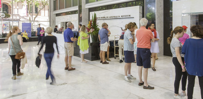 (Top) The Head Office foyer during Sydney Open, November 2016; (above) Sydney Open visitors watch 'Planned for Progress', a film depicting the construction of the Reserve Bank's Head Office building, November 2016