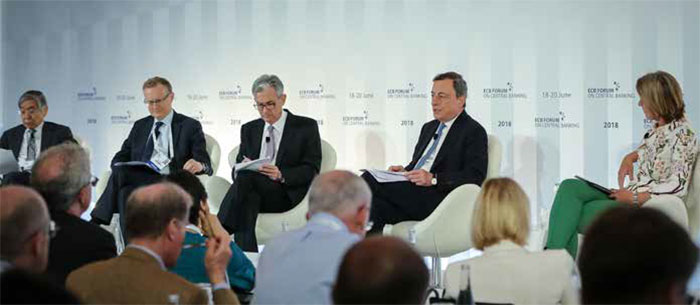 Bank of Japan Governor Haruhiko Kuroda, Governor Philip Lowe, Federal Reserve Chairman Jerome Powell, European Central Bank President Mario Draghi and moderator Stephanie Flanders of Bloomberg Economics at the ECB Forum on Central Banking, Sintra, Portugal, June 2018