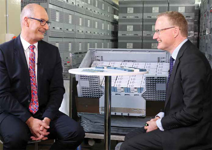 (Top) the ‘New Australian banknotes: $10 security features’ video, available at <https://banknotes.rba.gov.au/resources/videos/new-10-security-features/> has been viewed more than 40,000 times; (above) Governor Philip Lowe (right) speaks to David Koch from Channel 7's <em>Sunrise</em> program on 20 September 2017, the day the new $10 entered general circulation