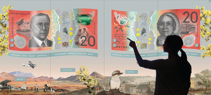 A visitor to the Museum explores the new $20 banknote using the multi-touch screen