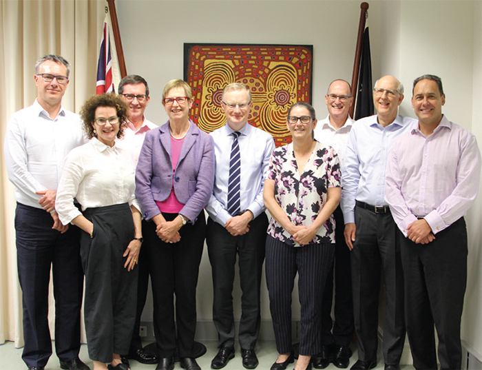 Reserve Bank Board members in Darwin, July 2019, following the Board meeting held in Parliament House, (from left) Deputy Governor Guy Debelle, Carol Schwartz, Ian Harper, Wendy Craik, Governor Philip Lowe, Catherine Tanna, Philip Gaetjens, Allan Moss and Mark Barnaba