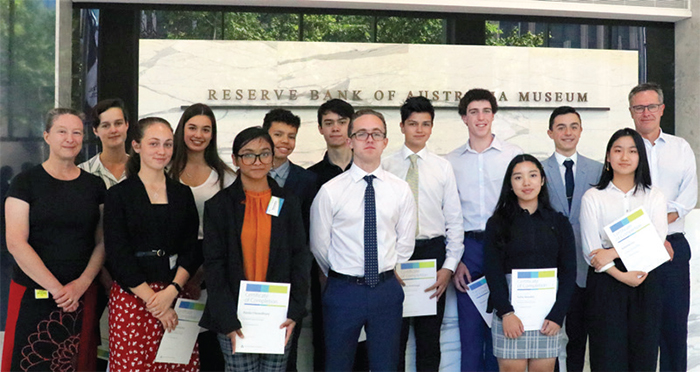 (Above) Work experience students with Head of Economic Analysis Department Alexandra Heath (far left) and Deputy Governor Guy Debelle (far right);