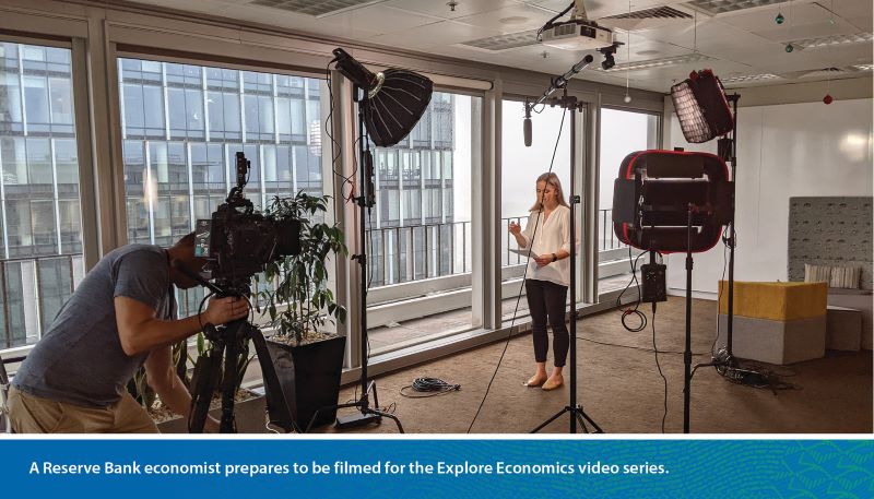 A Reserve Bank economist prepares to be filmed for the Explore Economics video series.
