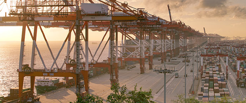 Early morning mood at a maritime container loading facility