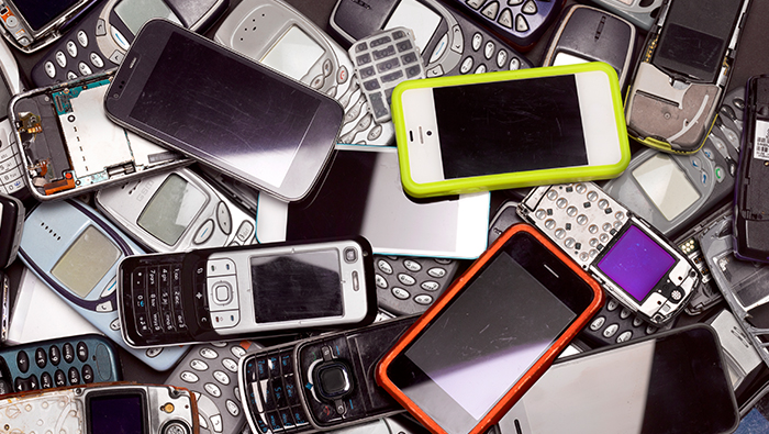 A collection of old and new mobile phones.