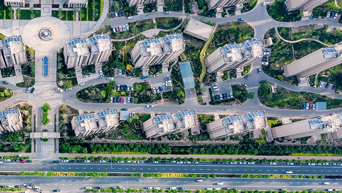 An aerial view of motorways and skyscrapers in a residential area in Beijing, China.