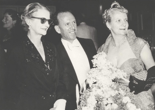 Archival photos of Dr HC Coombs with Mrs Coombs and Elsie Beyer, all in fine clothing, for the first Elizabethan Ball of the Australian Elizabethan Theatre Trust.