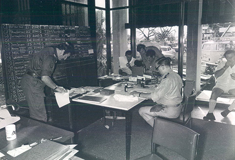 Police operating the emergency coordination and communications centre in the Banking Chamber following Cyclone Tracy, 1974.<br><br> <small>RBA Archives PN-009359</small>
